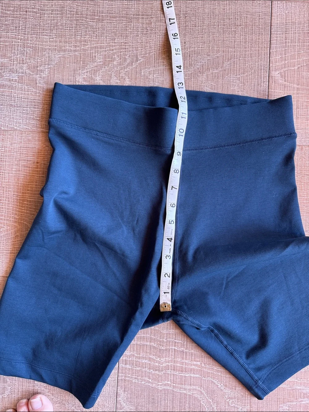 Nike women’s Marine Blue Bike Shorts with White Swoosh NWOT M